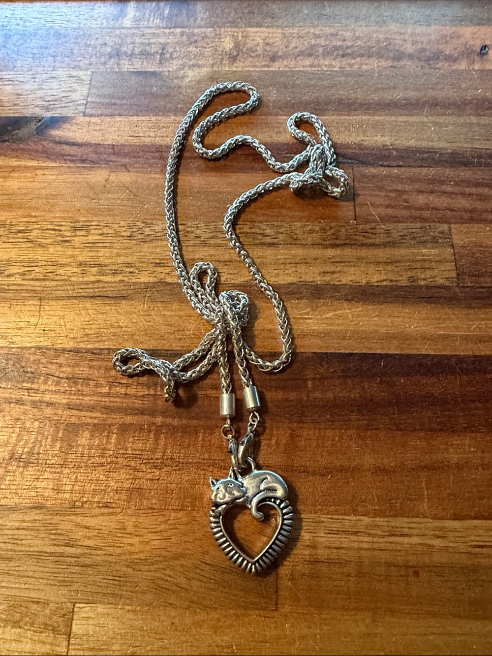Silver Tone Cat On Ridged Heart Necklace